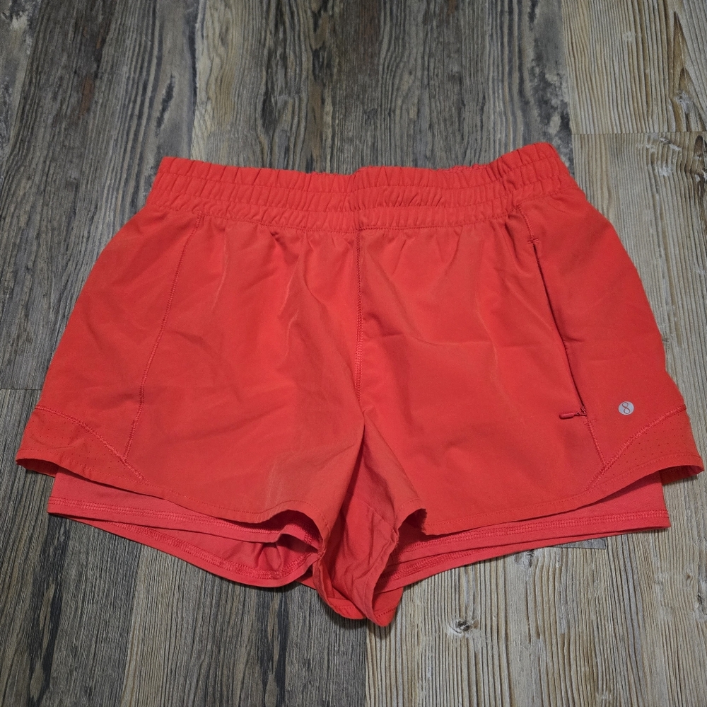 Red Athletic Shorts with Compression Layer and Elastic Waistband